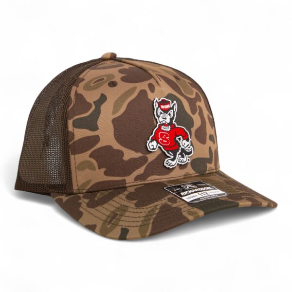 NC State Wolfpack Strutting Wolf 3D Snapback Trucker Hat- Bark Duck Camo/ Brown